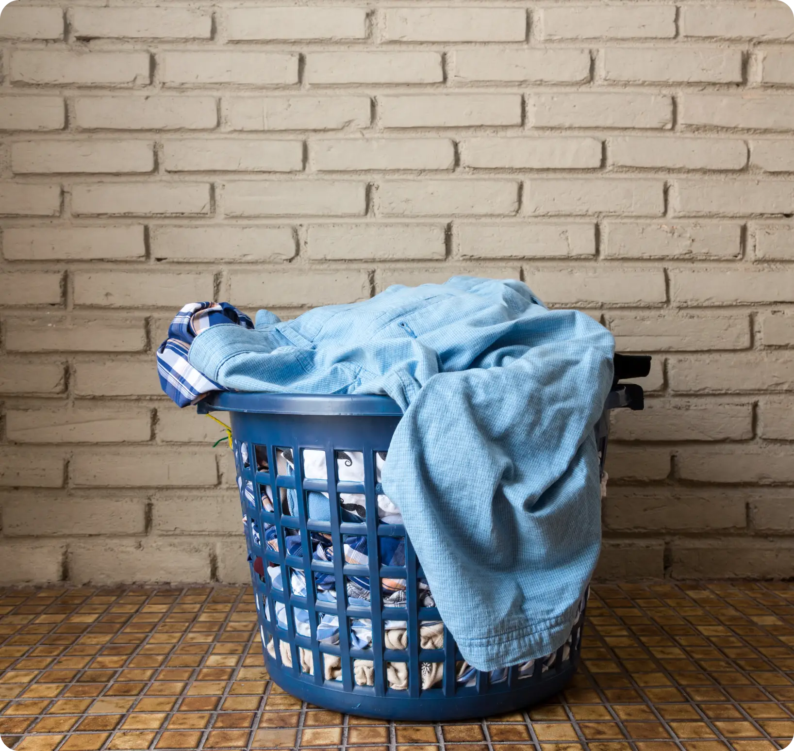 This is a Blue Plastic Laundry Basket